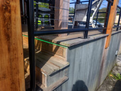 On simple projects, the detailing is everything, here is a well executed railing and lighting detail at the stairs.